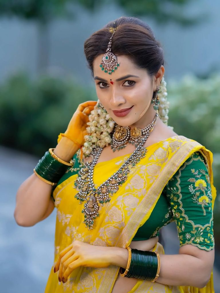 Beautiful yellow draping showcases Shobha Shetty's traditional fashion expertise