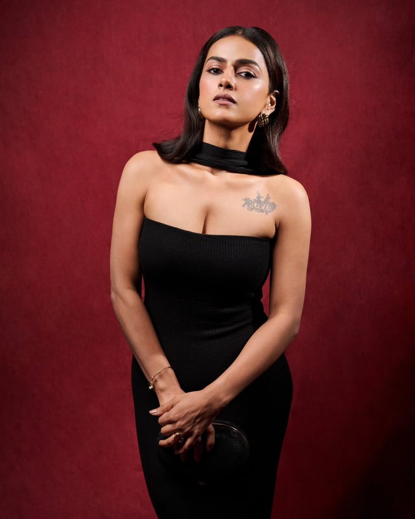 Bold black tube dress styling showcases Shraddha's artistic arm tattoo