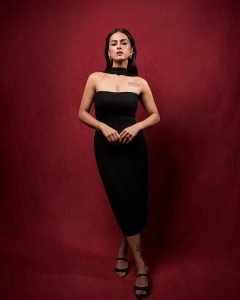 Bold black tube dress styling showcases Shraddha's artistic arm tattoo