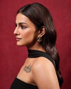 Bold black tube dress styling showcases Shraddha's artistic arm tattoo