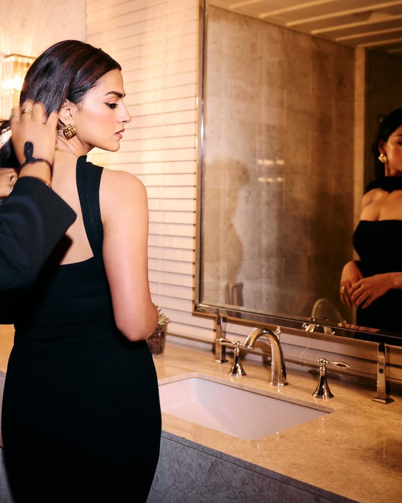 Shraddha embodies confidence in minimalist black tube dress with body art