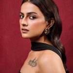 Shraddha embodies confidence in minimalist black tube dress with body art