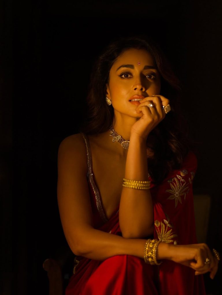 Gorgeous red saree creates dramatic elegance for Shriya's traditional portrait