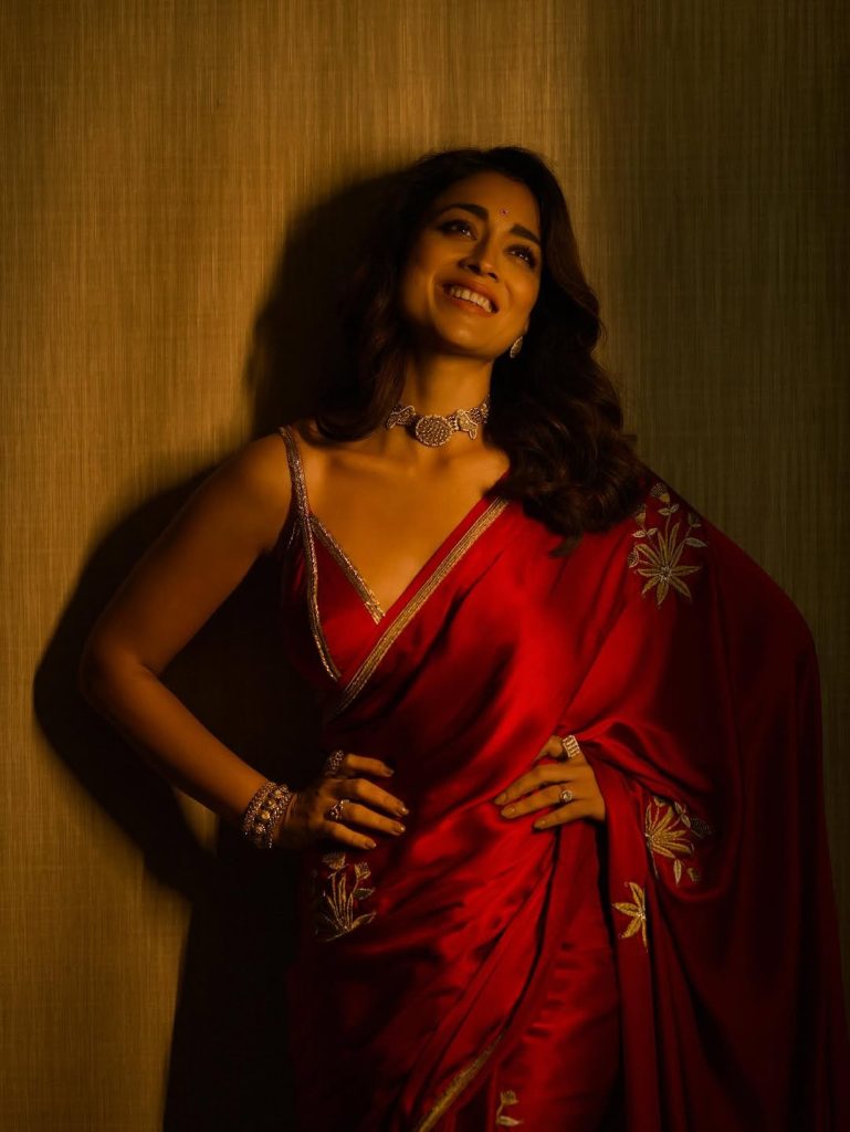 Gorgeous red saree creates dramatic elegance for Shriya's traditional portrait