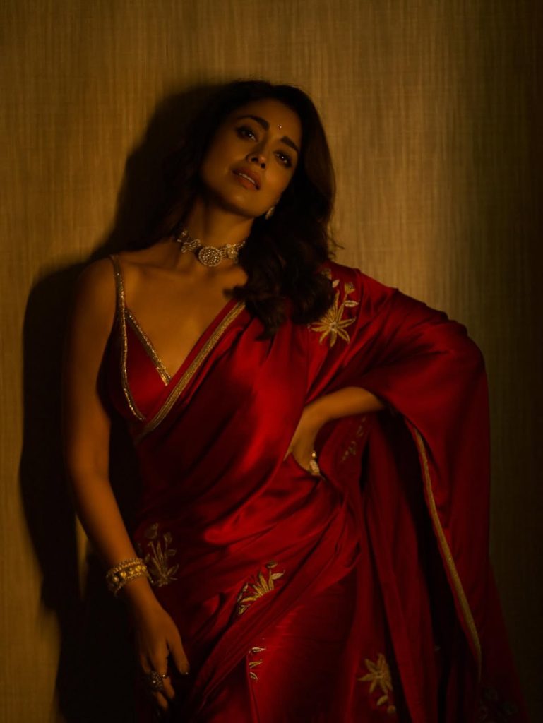 Gorgeous red saree creates dramatic elegance for Shriya's traditional portrait