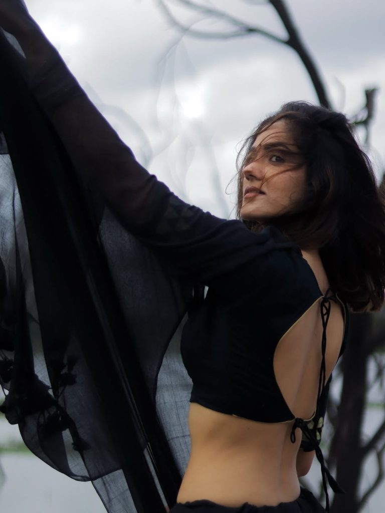 Elegant black saree creates sophisticated glamour for Simran Choudhary's portrait