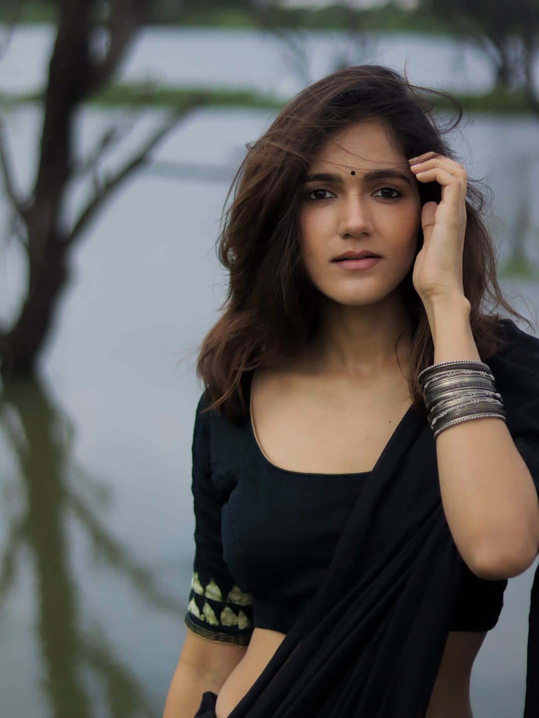 Elegant black saree creates sophisticated glamour for Simran Choudhary's portrait
