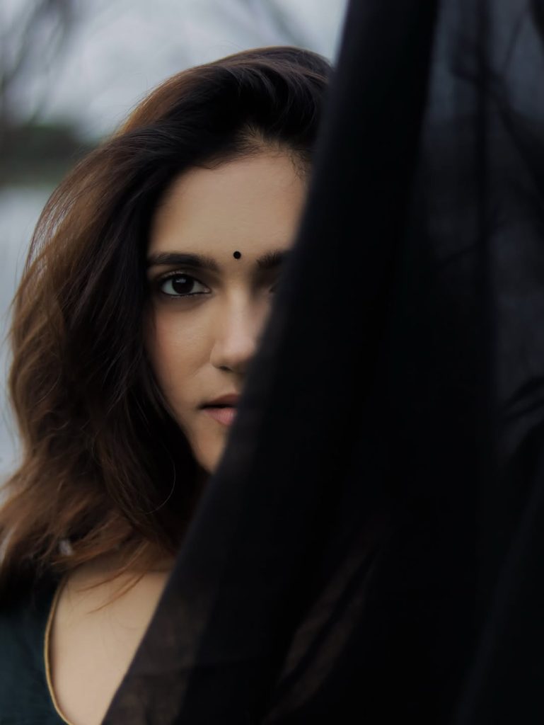 Elegant black saree creates sophisticated glamour for Simran Choudhary's portrait