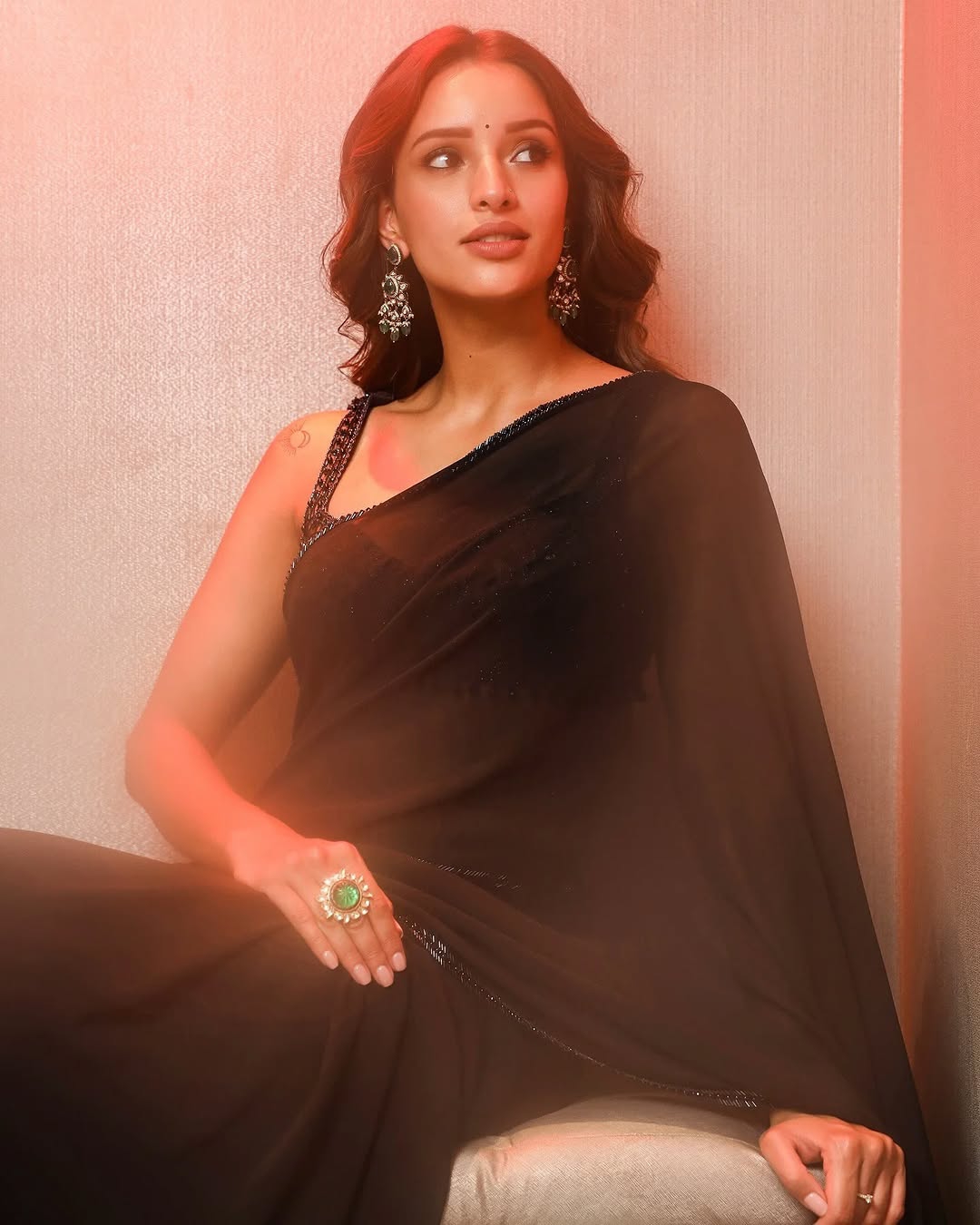 Dramatic black draping creates powerful visual impact in Tripti's photography