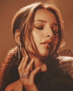 Artistic moon-sun tattoo revealed in Tripti's elegant black gown styling