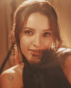 Tripti showcases celestial body art through sophisticated black gown photography