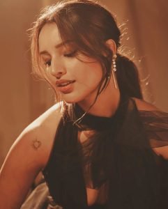 Artistic moon-sun tattoo revealed in Tripti's elegant black gown styling