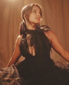 Artistic moon-sun tattoo revealed in Tripti's elegant black gown styling