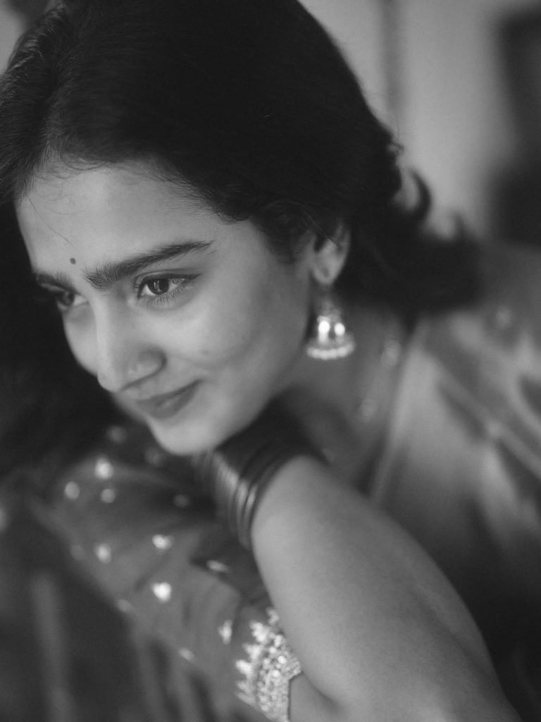 Elegant saree draping showcases Yoga Lakshmi's traditional fashion expertise
