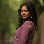 Purple pleated gown creates graceful movement in Yoga Lakshmi's outdoor photography