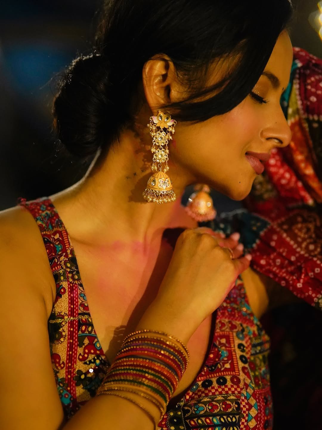 Close-up of Aarushi Baruah bandhani tie-dye pattern saree seaside