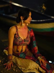 Close-up of Aarushi Baruah bandhani tie-dye pattern saree seaside