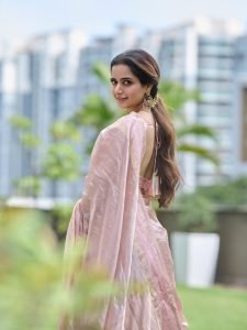 Ashika Ranganath elegant pink silk saree traditional studio portrait
