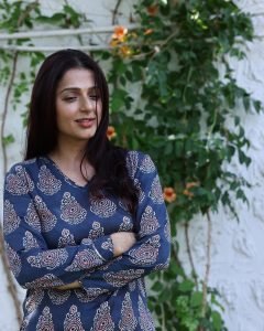 Bhumika Chawla elegant stance in blue print dress garden setting