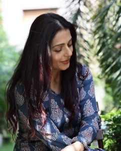 Natural outdoor backdrop with Bhumika Chawla stylish blue dress