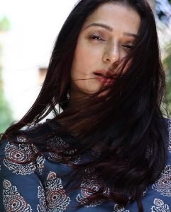 Natural outdoor backdrop with Bhumika Chawla stylish blue dress