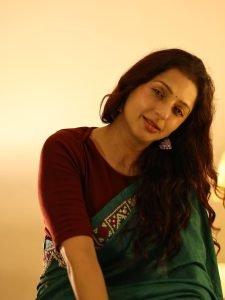 Handwoven texture visible in Bhumika Chawla teal saree closeup