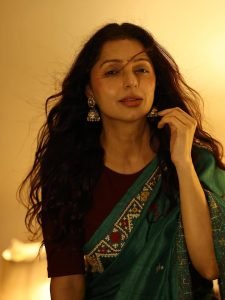 Warm atmosphere showcasing Bhumika Chawla teal handloom fabric