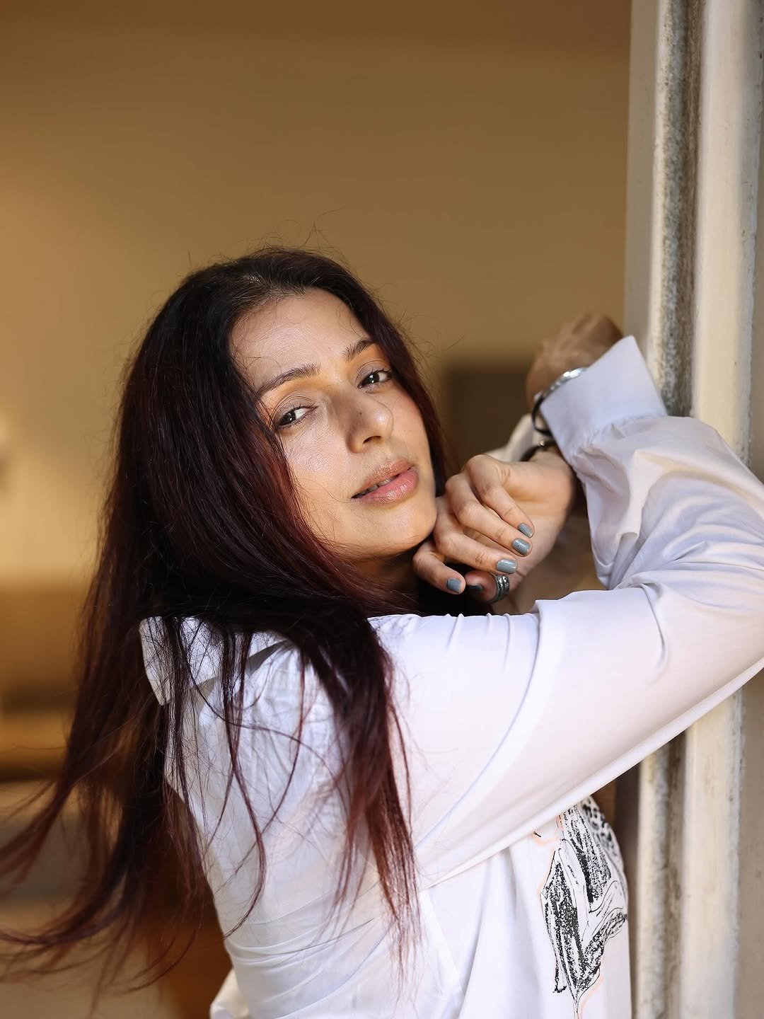 Bhumika Chawla white cartoon shirt windswept hair Photoshoot (4)