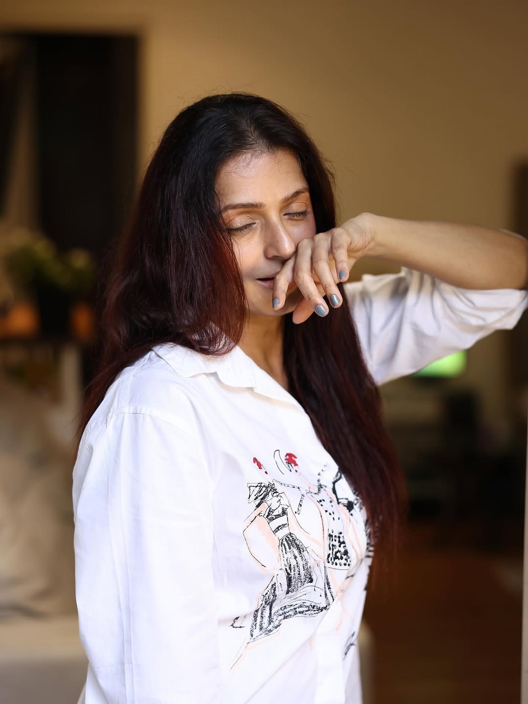 Bhumika Chawla white cartoon shirt windswept hair Photoshoot (6)