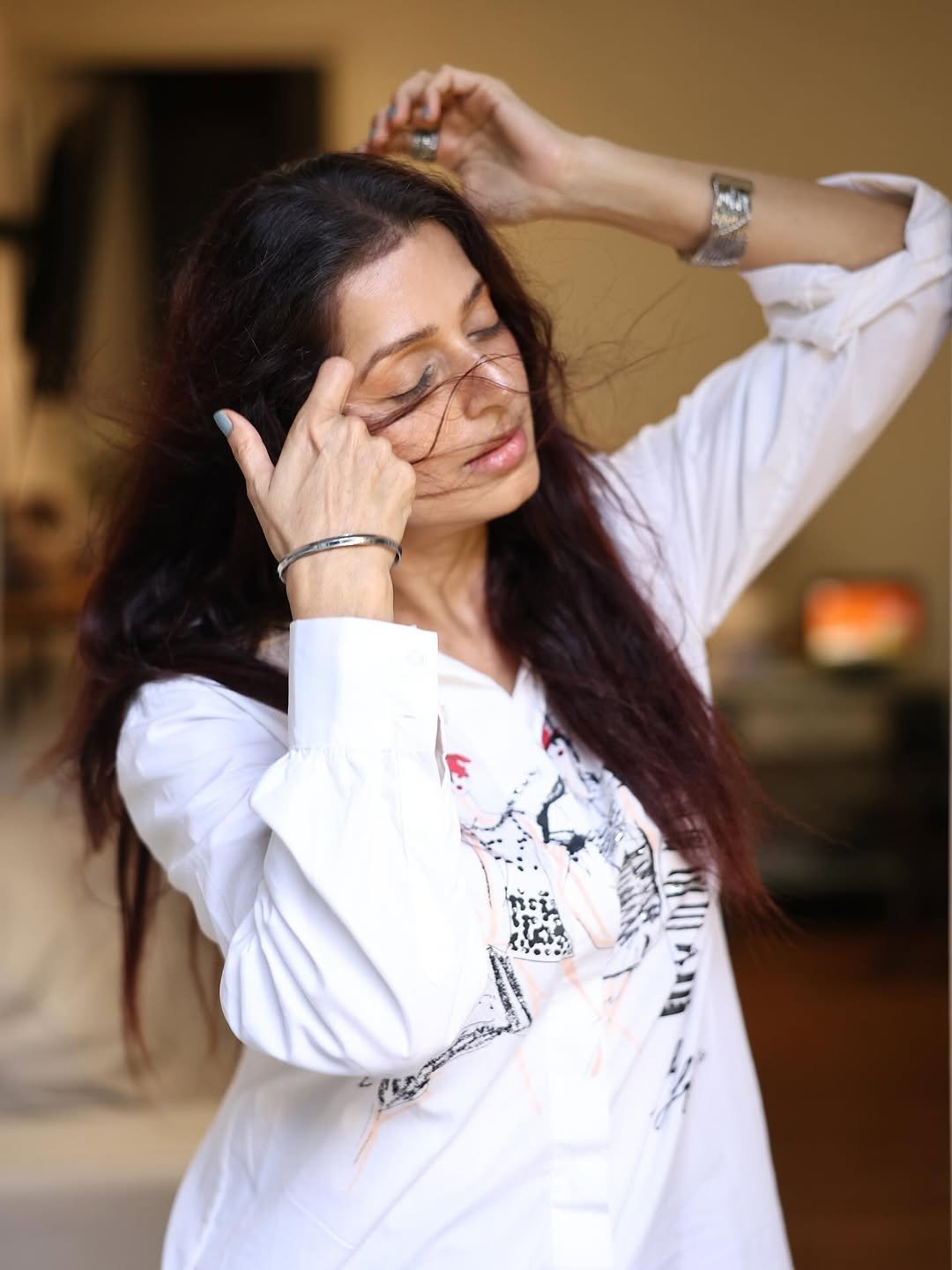 Bhumika Chawla white cartoon shirt windswept hair Photoshoot (7)