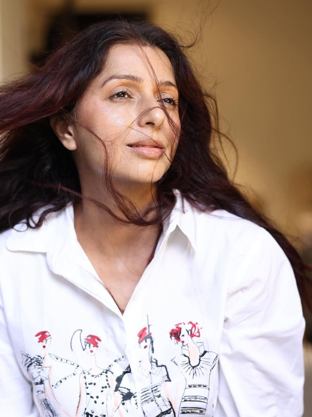 Bhumika Chawla white cartoon shirt windswept hair Photoshoot (8)