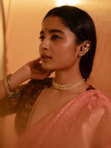 Chaithra J Achar traditional ikat blouse paired with rose saree