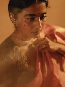 Chaithra J Achar rose saree with traditional ikat pattern blouse