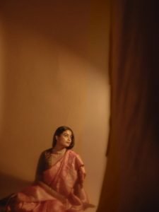 Chaithra J Achar rose saree with traditional ikat pattern blouse