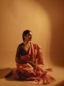 Chaithra J Achar traditional ikat blouse paired with rose saree