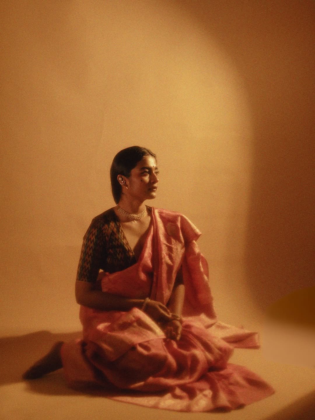 Chaithra J Achar rose saree ikat blouse pearl choker warm glow Portrait (2)