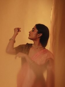 Pearl choker necklace detail on Chaithra J Achar elegant portrait