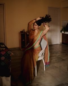Dramatic indoor shadows on Deepti Sati artistic saree portrait
