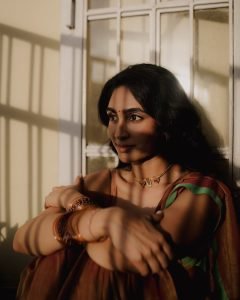 Dramatic indoor shadows on Deepti Sati artistic saree portrait