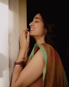 Dramatic indoor shadows on Deepti Sati artistic saree portrait