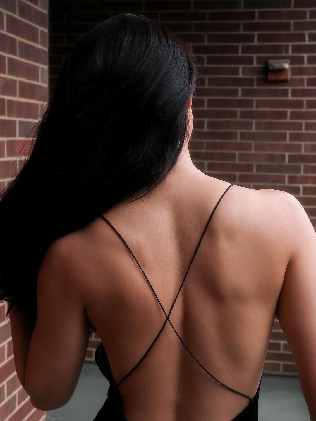 Disha Patani black slip dress outdoor steps (3)