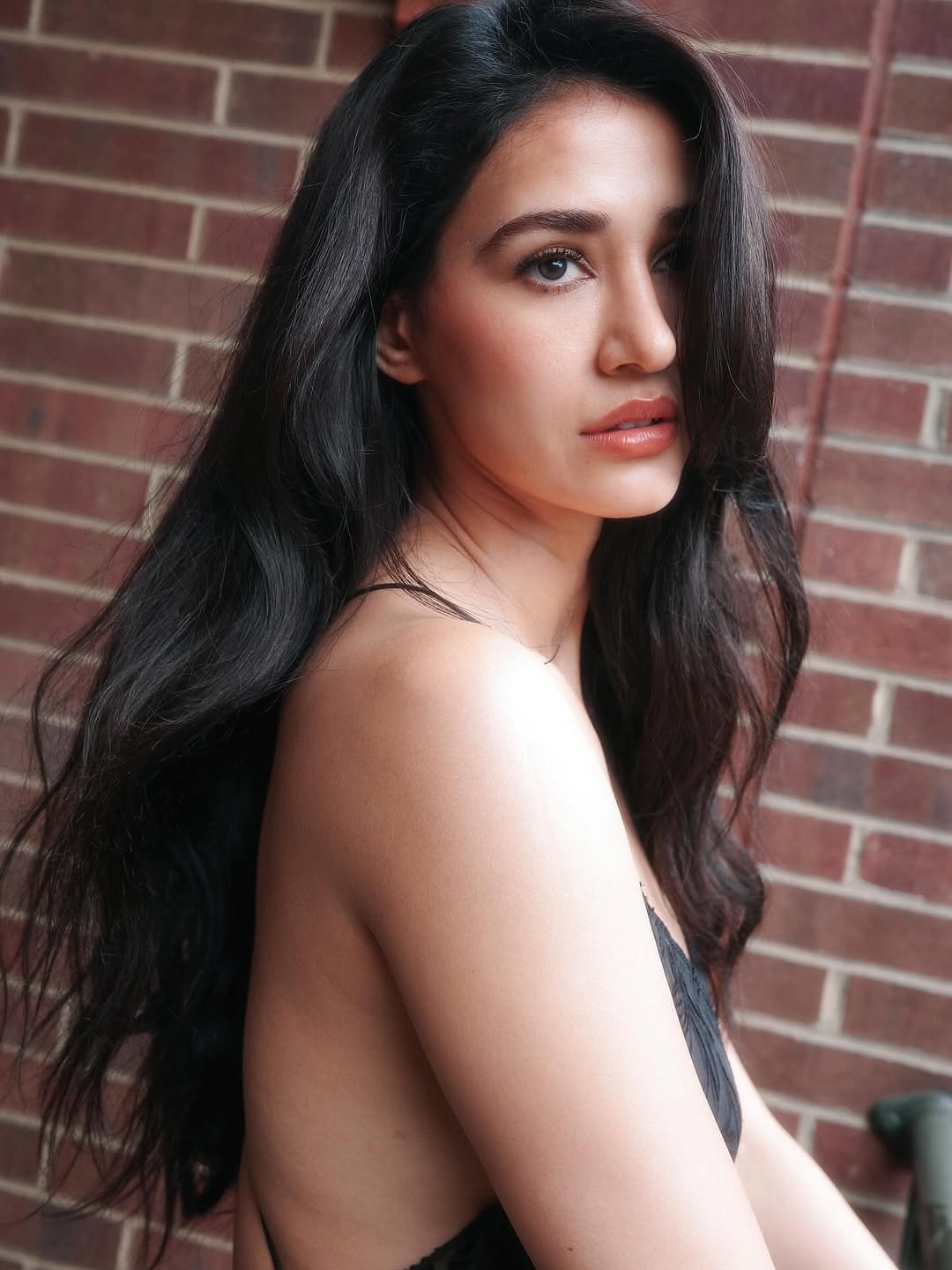 Disha Patani black slip dress outdoor steps (7)