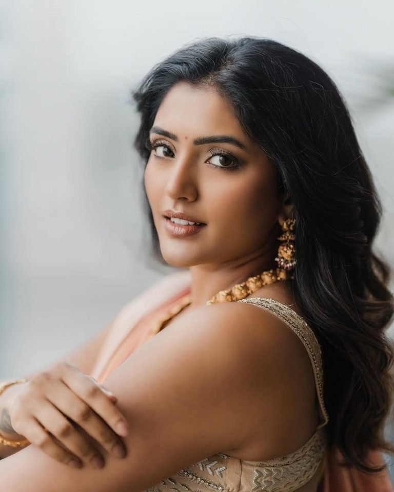 Eesha Rebba peach silk saree with elaborate temple jewelry set