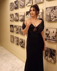 Close-up of Eshanya Maheshwari black sequin gown detail sunset lighting