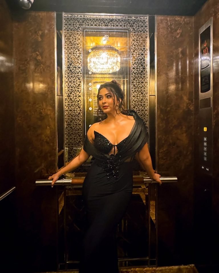 Sunset glow illuminating Eshanya Maheshwari sparkling sequin gown