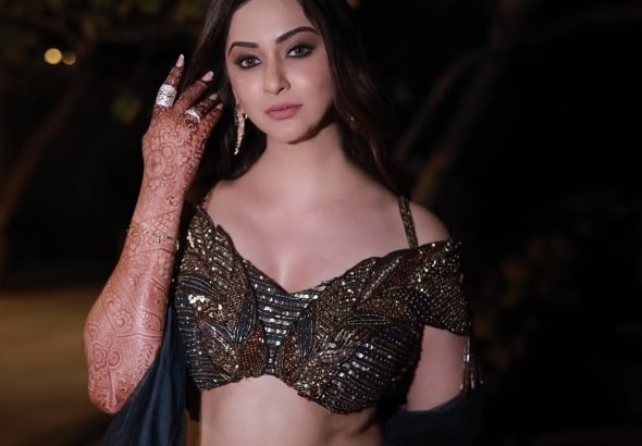 Detailed embroidery on Eshanya Maheshwari's lehenga under night lights