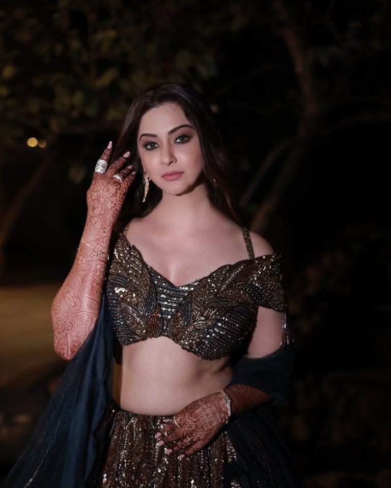 Detailed embroidery on Eshanya Maheshwari's lehenga under night lights