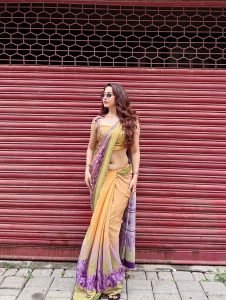 Dynamic shot of Eshanya Maheshwari multicolor saree street style fashion
