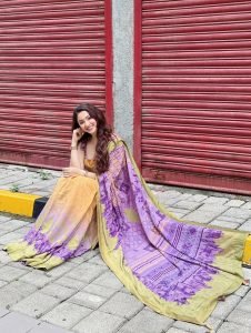 Eshanya Maheshwari vibrant multicolor saree street photography pose