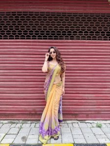 Dynamic shot of Eshanya Maheshwari multicolor saree street style fashion